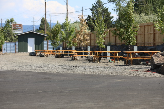 RV sites with picnic tables near the park building